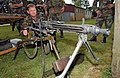 The MG3 seen here in the stationary, heavy machine gun role, mounted on a stabilized "Feldlafette" tripod fitted with an optical sight.