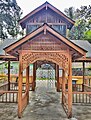 File:A wooden crafted welcoming home at Bahari satra Barpeta.jpg