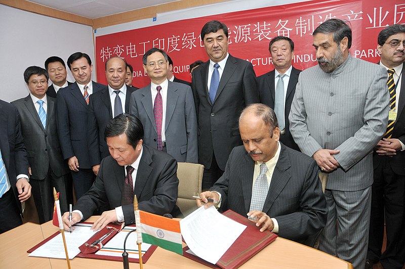 File:Anand Sharma and the Governor of Xinjiang Province of China, Mr. Nur Bekri witnessing the signing of MoU between Government of Gujarat and TBEA (India) Private Limited, in New Delhi on November 03, 2011.jpg