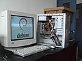 CRT monitor beside a desktop computer