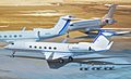 two gulfstreams, one global, snowy ramp at night