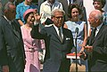 July 26 - Justice Hugo Black administers the oath of office for Arthur Goldberg as U.S. Ambassador to the United Nations. Lyndon Johnson (left) and Lady Bird Johnson (2nd from right) look on.