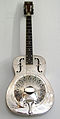 Resonator guitar with metal body