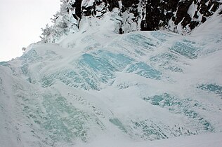 Close-up of Njupeskär water fall, frozen in winter