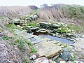 Fontaine et lavoir en bord de mer près de Pratmeur