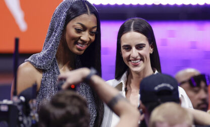 FILE - LSU's Angel Reese, left, and Iowa's Caitlin Clark, right, pose for a photo before the WNBA basketball draft, April 15, 2024, in New York. (AP Photo/Adam Hunger, File)