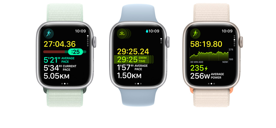 A picture of three Apple Watches. Each has different metrics and workout views on it.