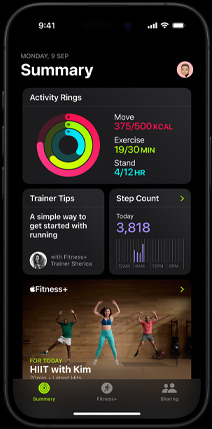 Summary tab screen in the Fitness app showing Activity rings, Trainer Tips, Step Count and recommended Fitness  workouts on iPhone