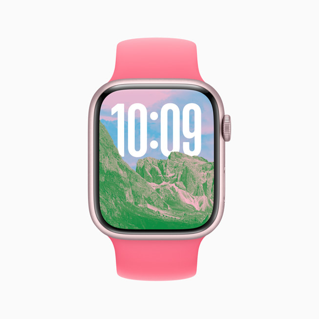 En Fotos-urskive på Apple Watch Series 9 viser høje bjerge.