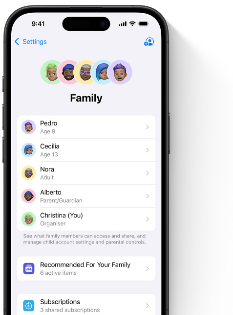 iPhone screen showing the Family page in Settings, Memojis of individual family members, each set against its own colourful circle, arrayed at the top, same Memojis in a list beneath them showing all members of the Family Sharing group