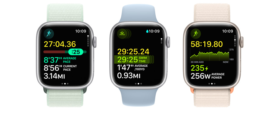 A picture of three Apple Watches. Each has different metrics and workout views on it.