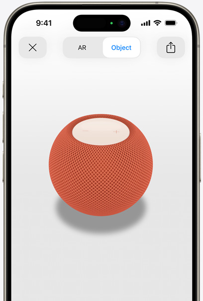 Der HomePod in Orange auf dem Display eines iPhone in AR Ansicht.