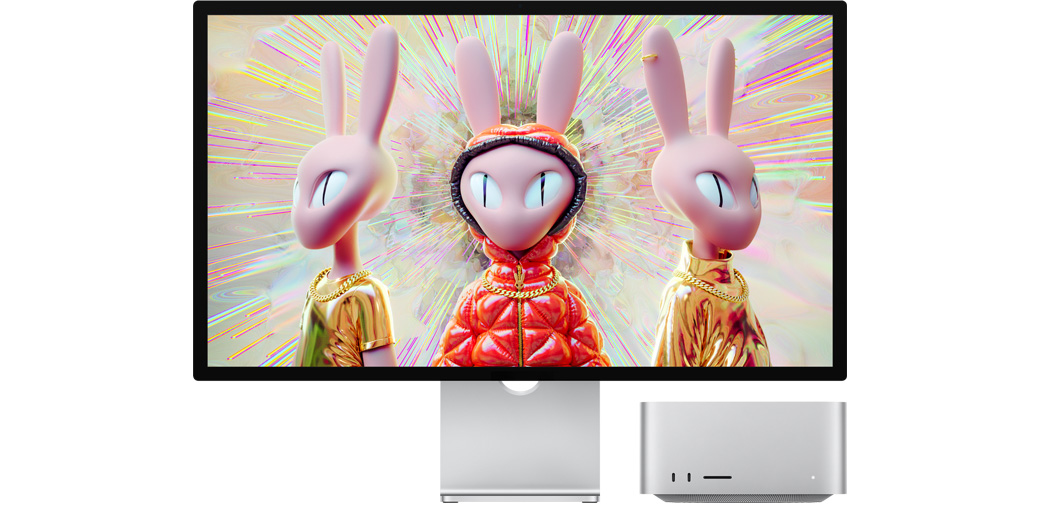 Mac Studio ao lado de um Studio Display a mostar uma imagem 3D com personagens de coelhos humanizados.