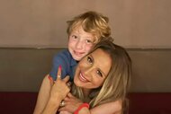 Dorit Kemsley and Jagger Kemsley smiling and hugging each other.