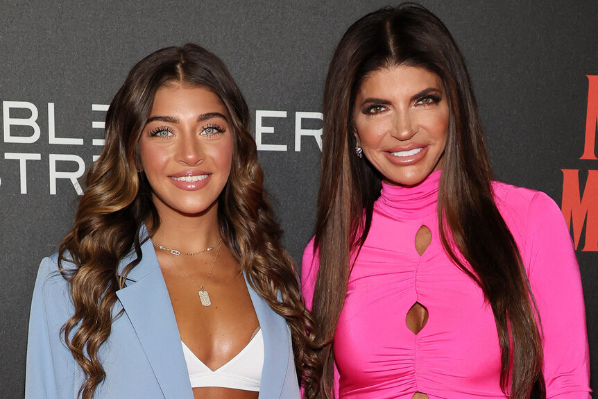 Teresa and Gia stand together while posing on the red carpet.