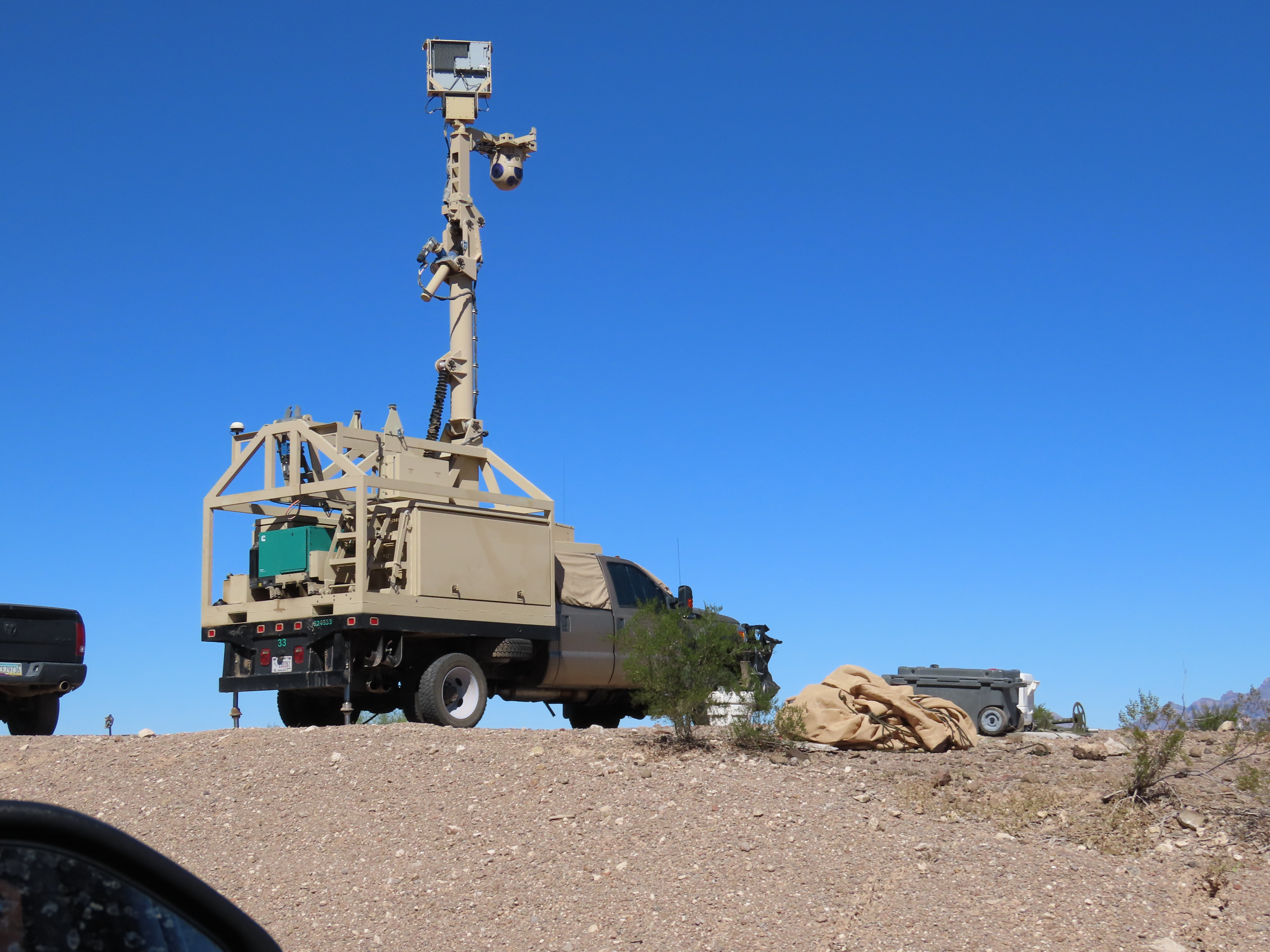 A Mobile Surveillance Capability surveillance device atop a truck in Pima County, AZ