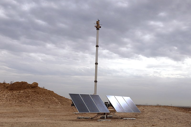 An Autonomous Surveillance Tower in a desert landscape.