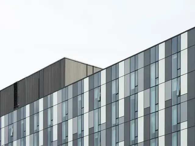 glass windows on the top of an office building