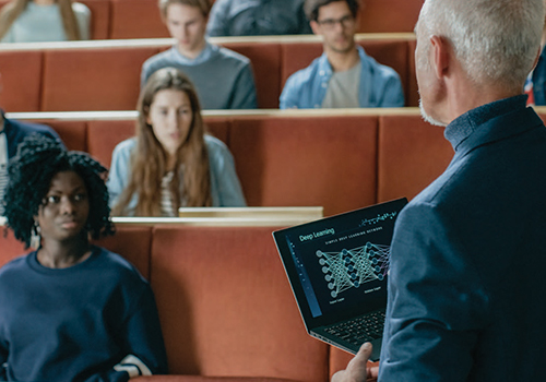 Teacher speaking to students