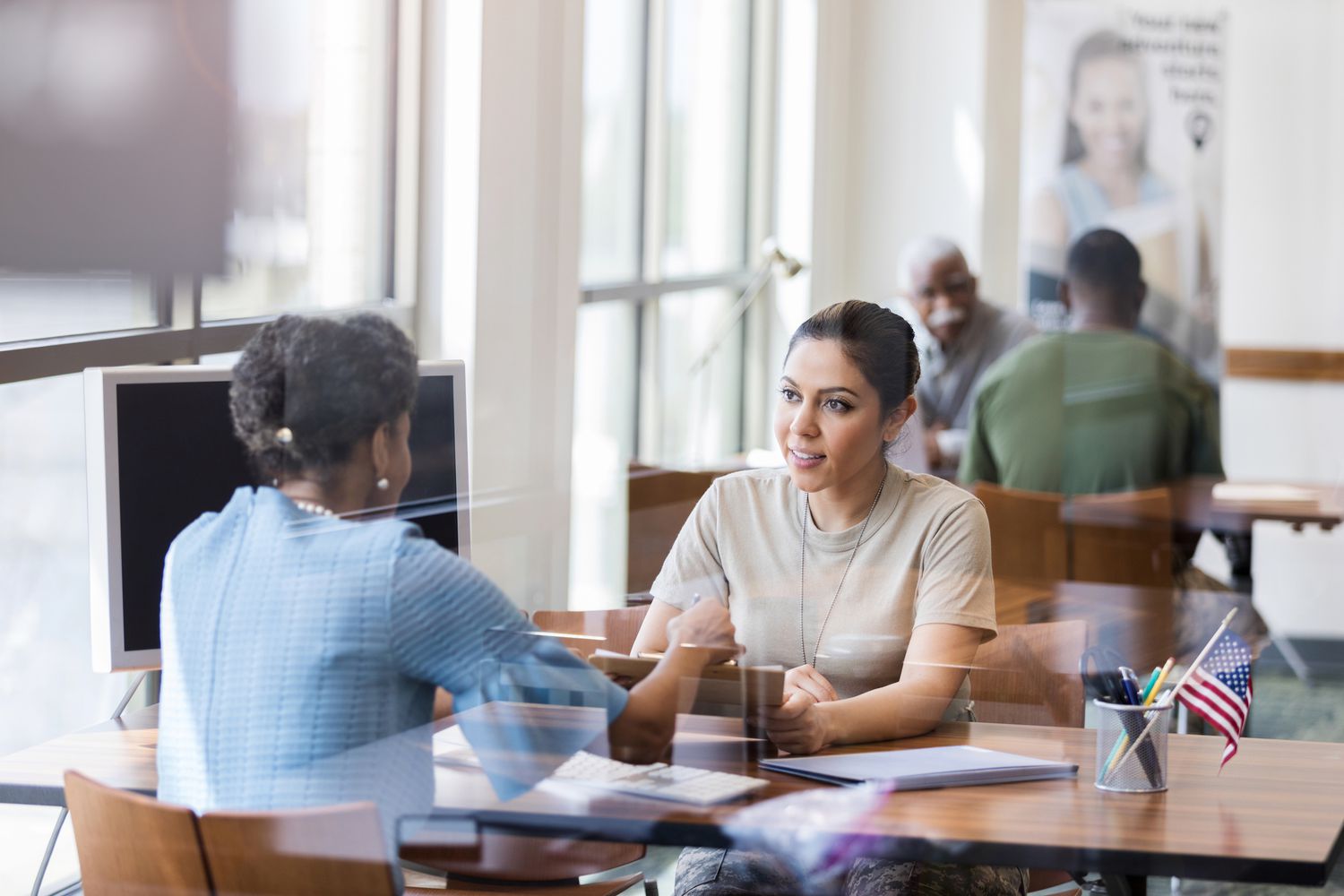 Banking customer speaks with representative about CDs