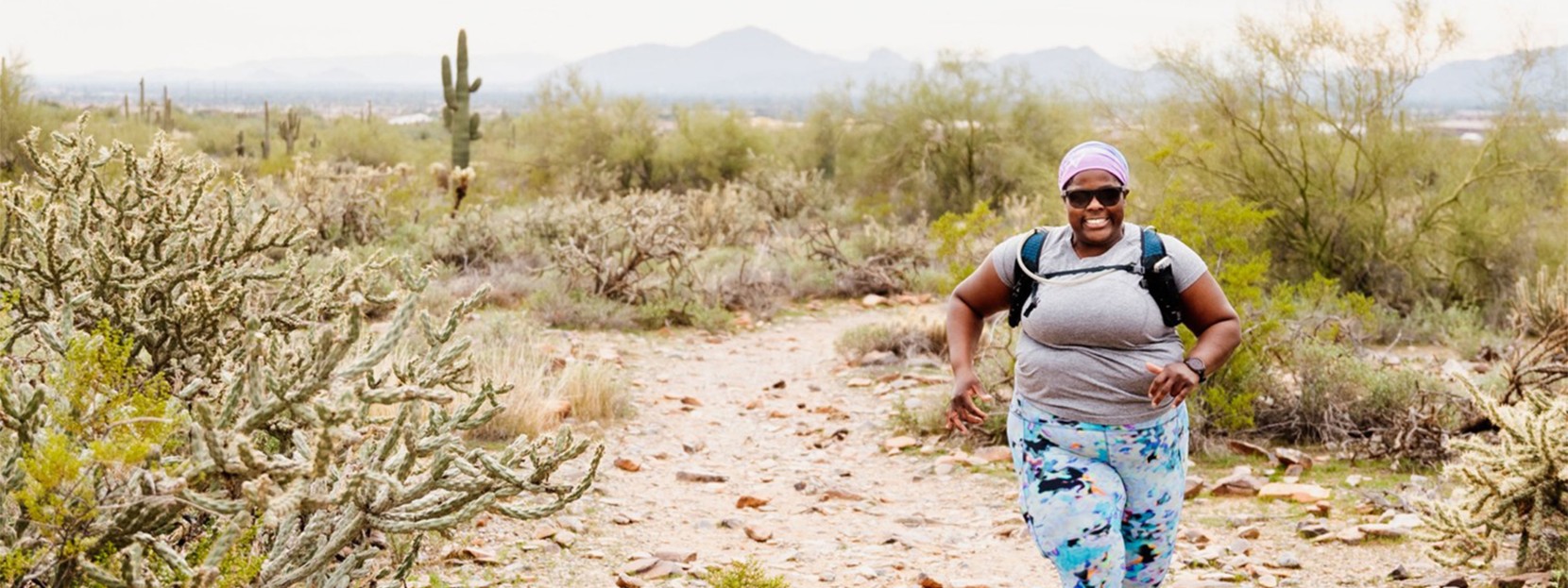 L.L.Bean Ambassador Mirna Valerio running in the desert.