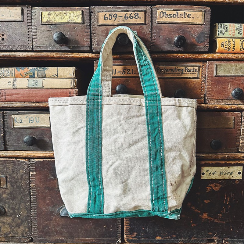 Vintage L.L.Bean Boat and Tote on display at Wooden Sleepers