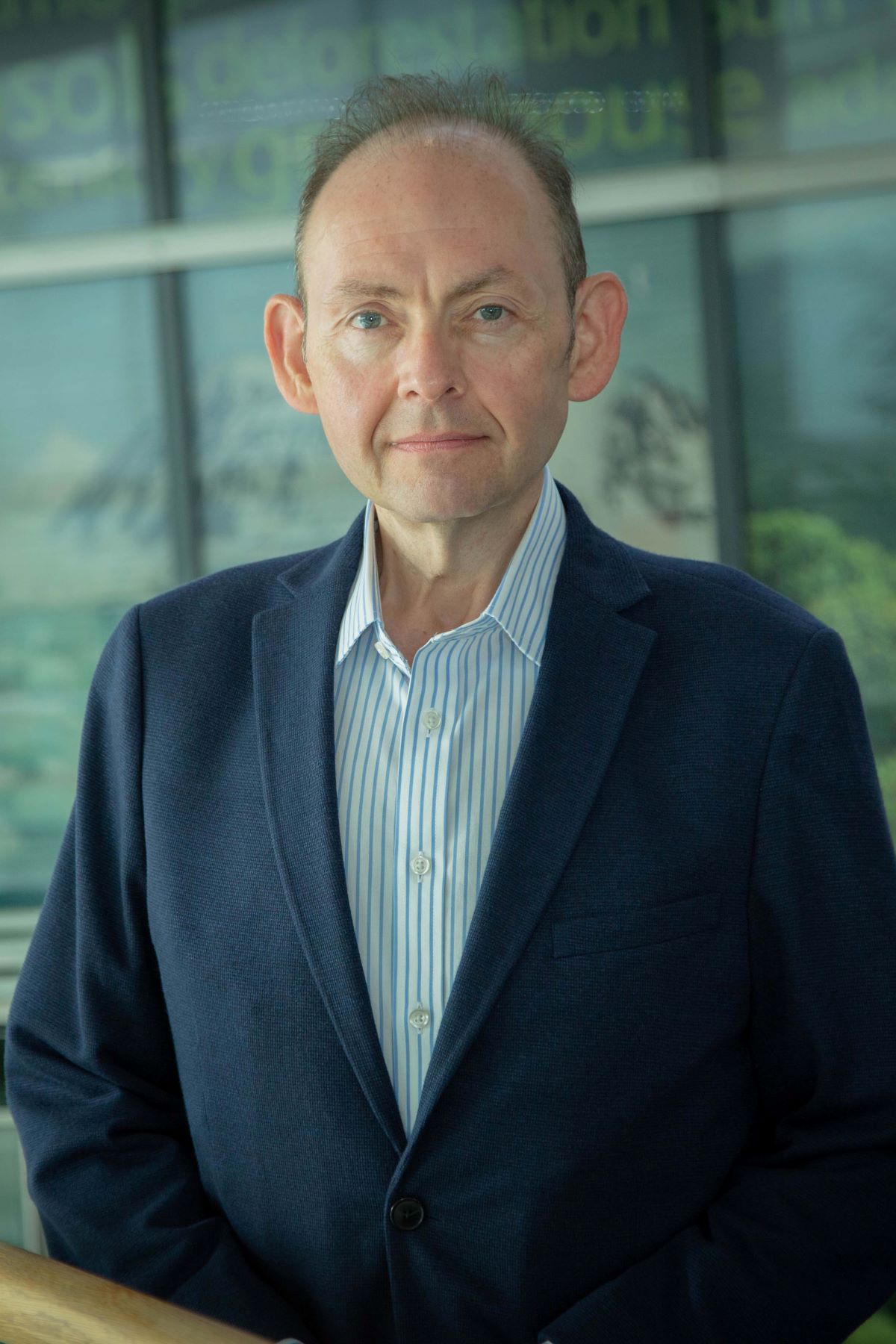 Corporate headshot of Jordan Giddings, Met Office Non Executive Director