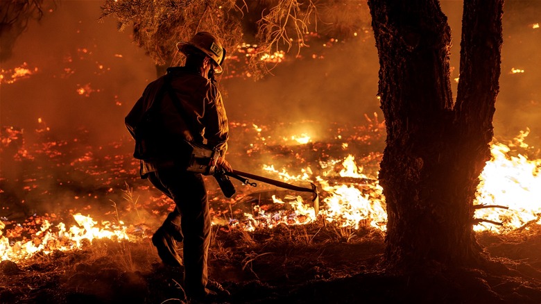 Firefighter battling fire