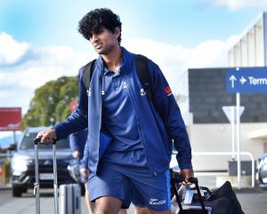 Rachin Ravindra arrives at Dunedin airport yesterday. PHOTO: PETER MCINTOSH