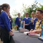 Jamie Oliver signs copies of his book 'Billy and the Epic Escape' during a visit to Great...