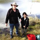 Nine-year-old Marama Eddy and granddad Paul Eddy, from Temuka, are happy with their catch at Loch...