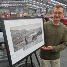 Photographer Sampford (Sam) Cathie displays his artwork at the Wheels at Wānaka Private Vehicle...