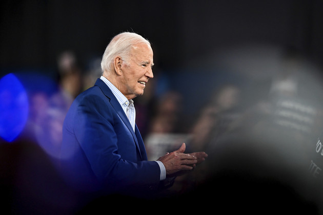 President Joe Biden looks on at a campaign rally.