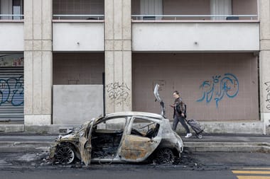 In French town under curfew, wave of violence leaves locals dazed and angry