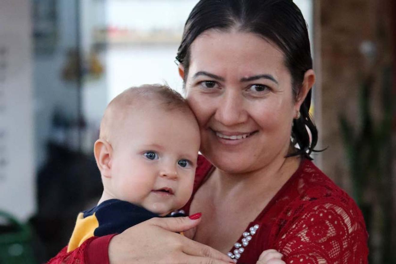 woman holding baby