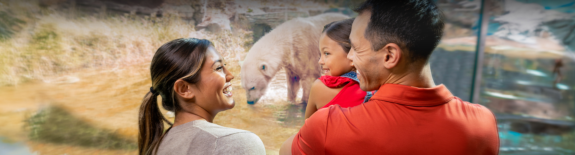 family in front of polar bear